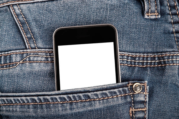 Mock up with smartphone in back jeans pocket. Blank space for your advertising or text on display. - Фото, изображение
