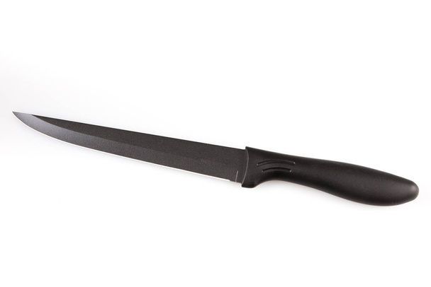 nůž dlouhý černý kuchyně kuchař na bílém pozadí - Fotografie, Obrázek
