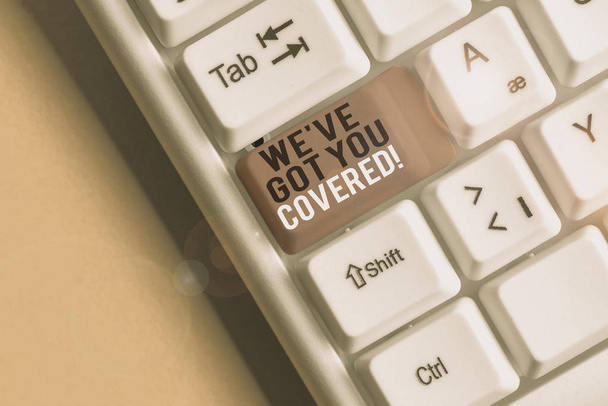 Text sign showing We Ve Got You Covered. Conceptual photo have done gotten or provided whatever needed White pc keyboard with empty note paper above white background key copy space. - Photo, Image