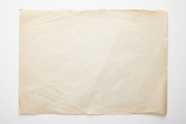 vista superior de papel vintage vacío sobre fondo blanco
 - Foto, Imagen
