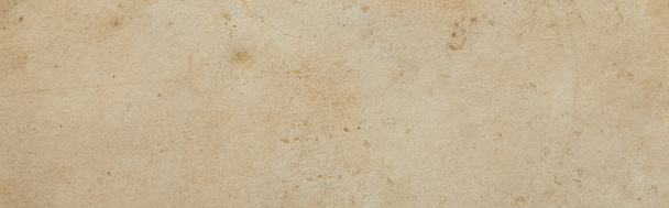 bovenaanzicht van vintage dirty beige papieren textuur met kopieerruimte, panoramische opname - Foto, afbeelding