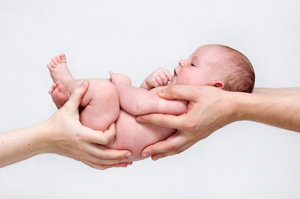 Little baby girl in parent hands - Foto, Imagen