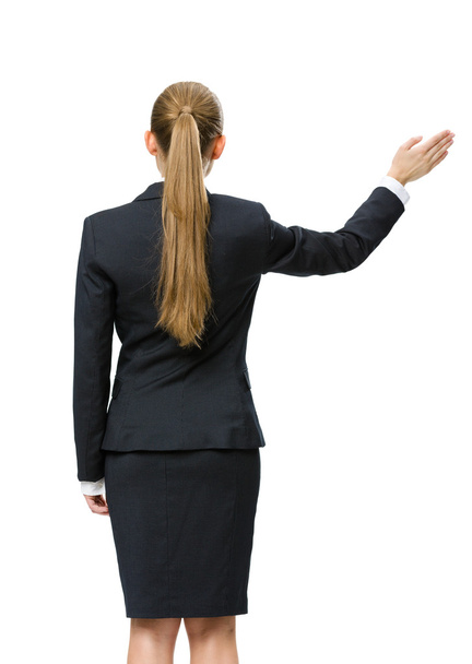 Backview of female manager waving hand - 写真・画像