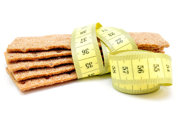Rye bread and measuring tape - Photo, Image