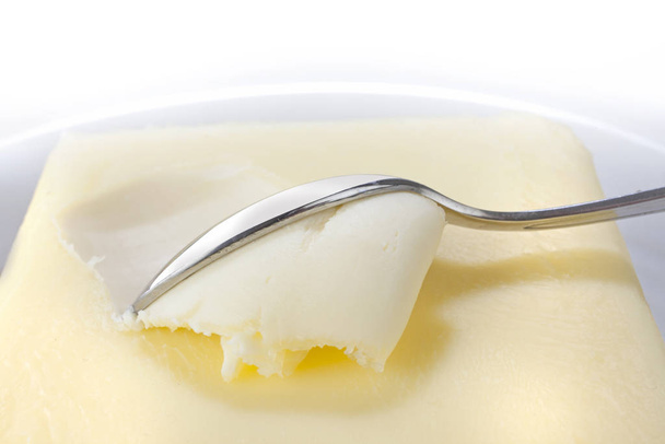 cuchara en la mantequilla
 - Foto, imagen