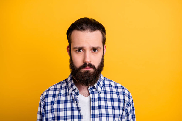 Close-up portrait of his he nice attractive disappointed brunette bearded guy wearing checked shirt isolated over bright vivid shine vibrant yellow color background - Фото, зображення