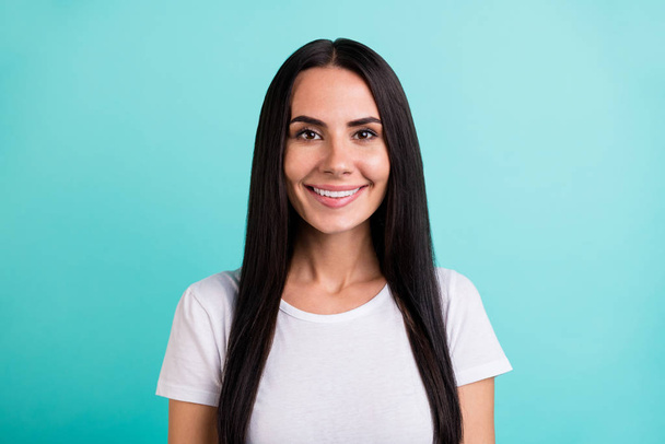 Portrait of cheerful cute nice girlfriend looking at you through camera isolated vivid teal color background - Valokuva, kuva