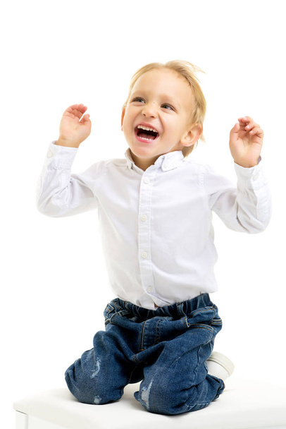 Handsome little boy laughing.The concept of a happy childhood - Photo, Image