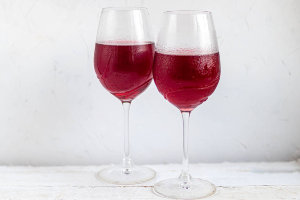Two glasses with red wine. On white background. - Zdjęcie, obraz