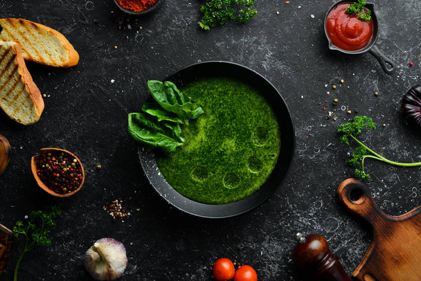 Spinach soup. Healthy food. Top view. Free space for your text. - Fotó, kép
