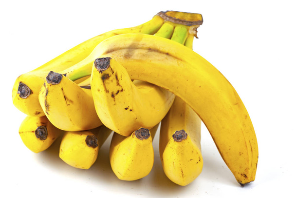 Ένα μάτσο μπανάνες απομονωμένες σε λευκό φόντο - Φωτογραφία, εικόνα