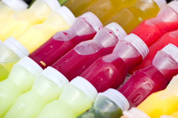 Tropical fruit juice in bottles. - Foto, imagen