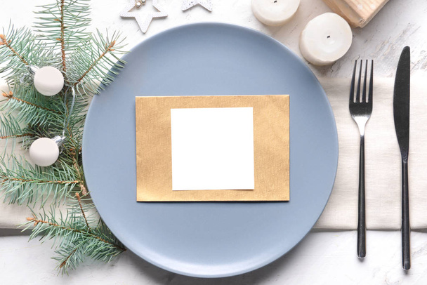 Beautiful table setting for Christmas dinner on white background - Foto, afbeelding