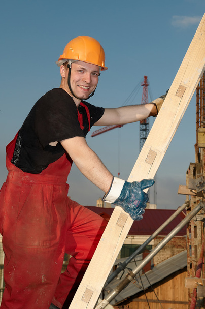 Builder at construction site - Foto, Imagen