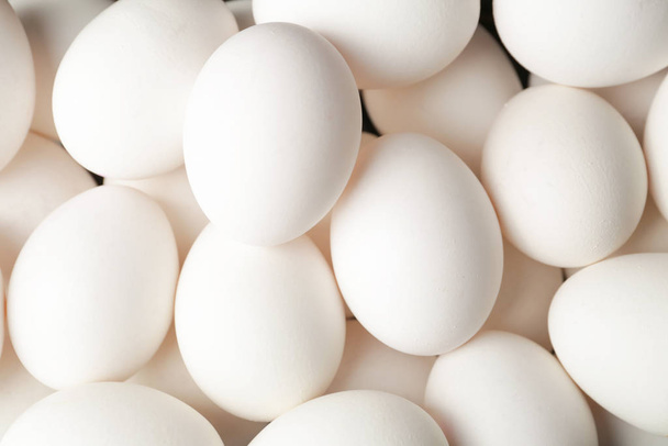 Fresh raw eggs as background - Foto, imagen