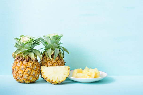 Fresh pineapple fruit on pastel background - Photo, Image
