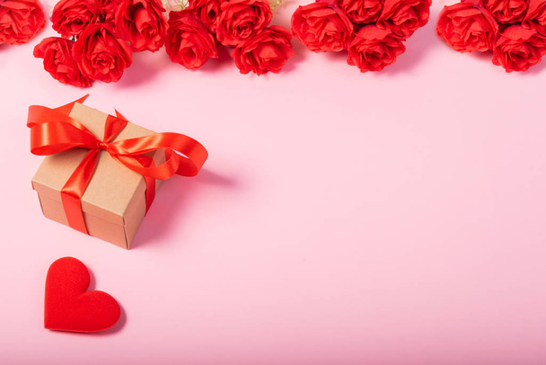 Valentines day and love concept. One small gift box with red hea - 写真・画像