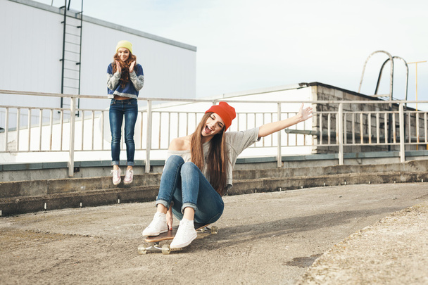 Two young longboarding girl friends - Zdjęcie, obraz