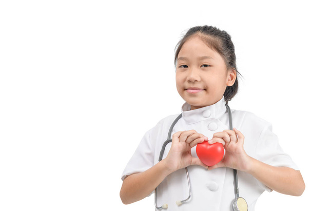 bonito asiático menina futuro médico vestido com estetoscópio e mostrar
  - Foto, Imagem