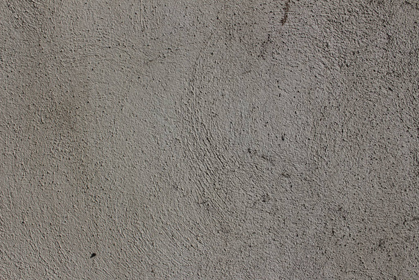 Rough curved lines on gray plaster wall - Photo, Image