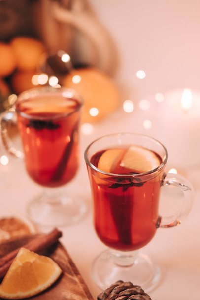 Atmospheric Christmas or New Year background with mulled wine. Close up of mulled wine, soft focus, shallow depth of field - Photo, Image