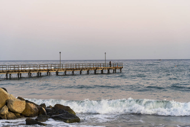 Wooden pier in Limassol overlooking the sea. - 写真・画像