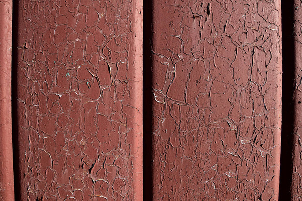 Unusual background, old red paint peels off the iron surface. Vintage abstract grunge background. - Photo, image