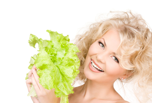 Happy woman with lettuce - Foto, afbeelding