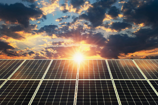 Solar panel sunset. concept clean energy, electric alternative,  - 写真・画像