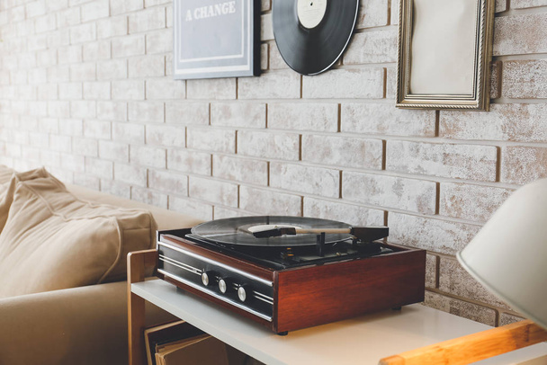 Record player on table in room - Fotó, kép