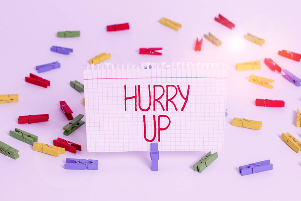 Writing note showing Hurry Up. Business photo showcasing asking someone to do a job very fast Quickly Lets go Encourage Colored clothespin papers empty reminder white floor background office. - Photo, Image