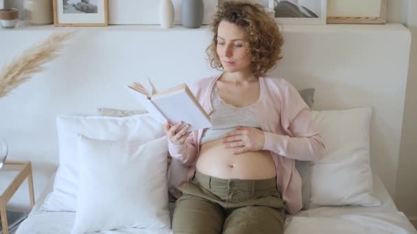 Happy Pregnancy Concept. Young Pregnant Woman Resting At Home On Bed. - Πλάνα, βίντεο