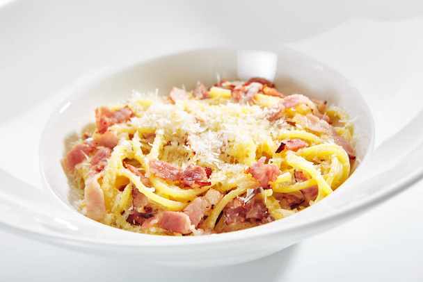 Macro Photo of Spaghetti Carbonara with Grated Parmesan and Baco - Photo, image