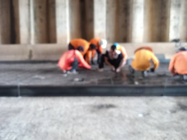 Trabajadores haciendo construcción de carreteras (imágenes borrosas
) - Foto, imagen