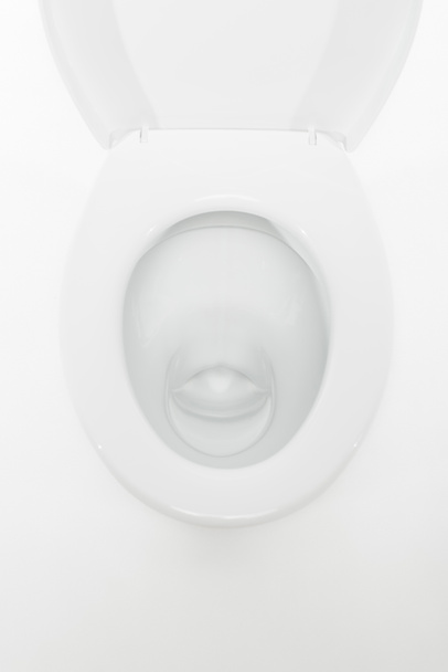 Draufsicht auf moderne Keramik saubere Toilettenschüssel isoliert auf weiß - Foto, Bild