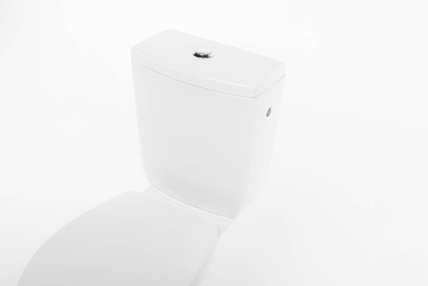 modern ceramic clean toilet bowl isolated on white - Valokuva, kuva