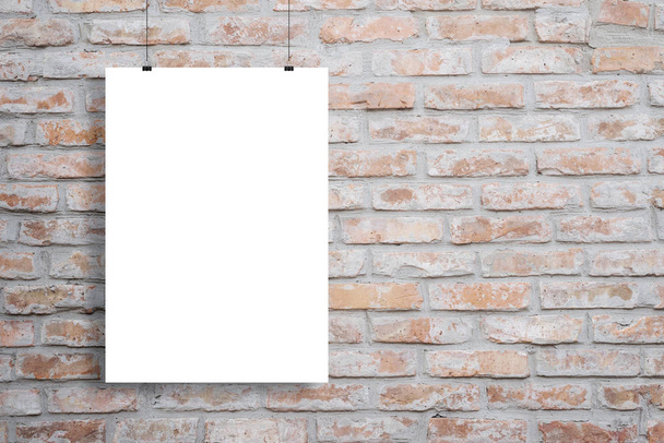 Blank poster mockup hanging across brick wall with copy space beside - Photo, Image