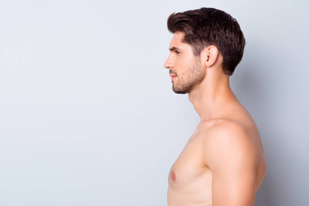 Close-up profile side view portrait of his he nice attractive content well-groomed calm brunette guy perfect smooth soft skin spa therapy isolated over light white grey color pastel background - Foto, Imagen