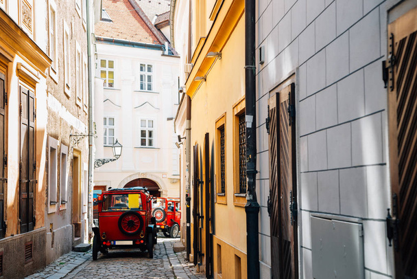 Old town street and city tour car in Bratislava, Slovakia - Fotografie, Obrázek