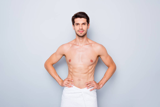 Photo of handsome macho man guy white towel around hips after taking morning shower naked torso masculine body isolated grey background - Foto, Imagen
