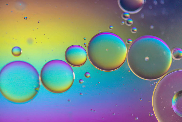 Multicolored abstract background picture made with oil, water and soap - Photo, image