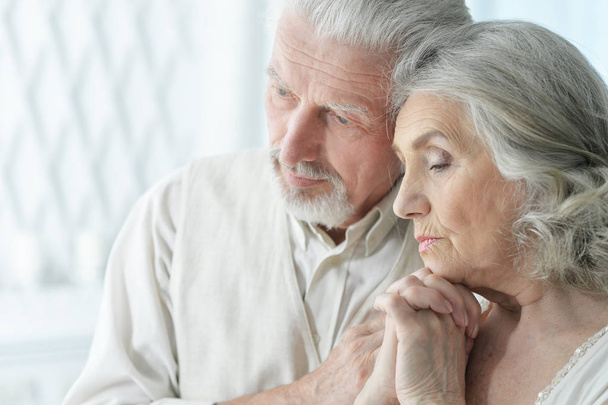 Portrait of sad senior couple posing at home  - Photo, Image
