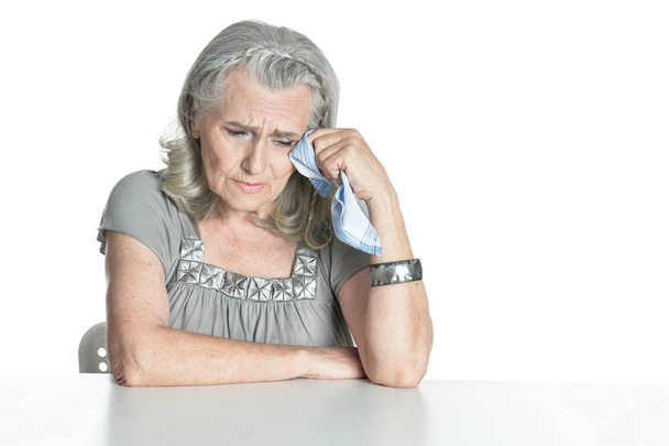 Senior woman crying on white background - Zdjęcie, obraz
