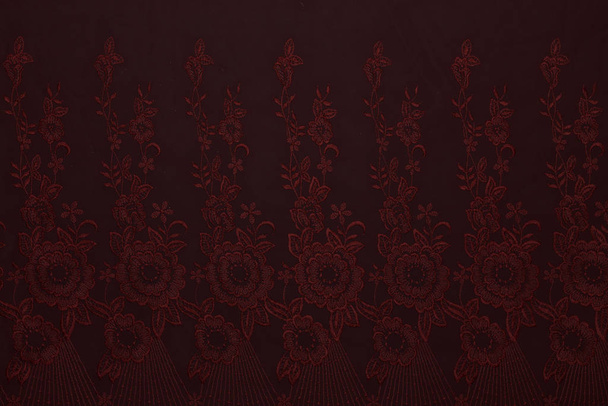 Beautiful red fabric with floral pattern and textile texture background - Фото, изображение