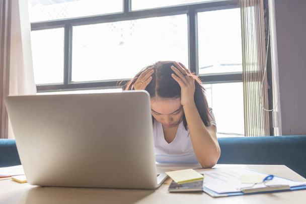 Tired freelancer holding head feel stressed about work - Φωτογραφία, εικόνα