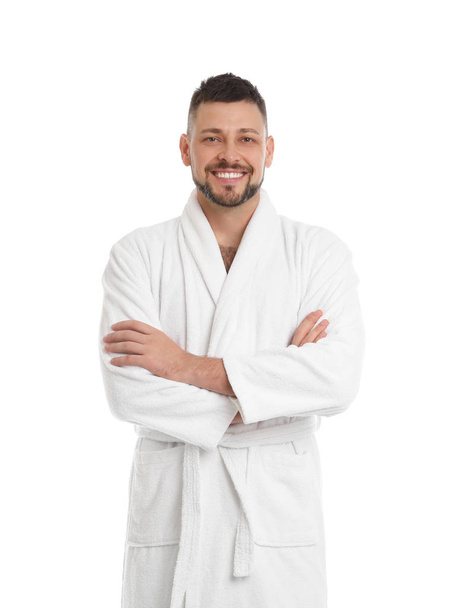 Handsome man wearing bathrobe on white background - Fotoğraf, Görsel