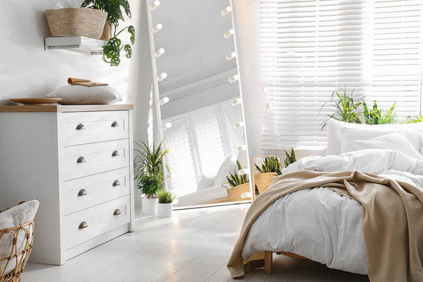 White chest of drawers in beautiful bedroom. Interior design - 写真・画像