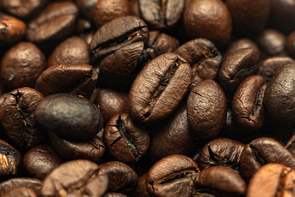 macro of roasted coffee beans background, the texture pattern - Foto, Imagem