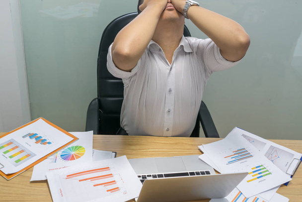 Businessman feels overstressed and exhausted because - Fotoğraf, Görsel