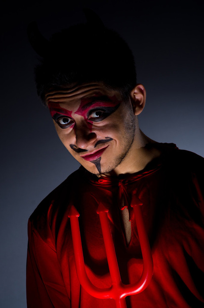 Man in devil costume in halloween concept - Photo, Image
